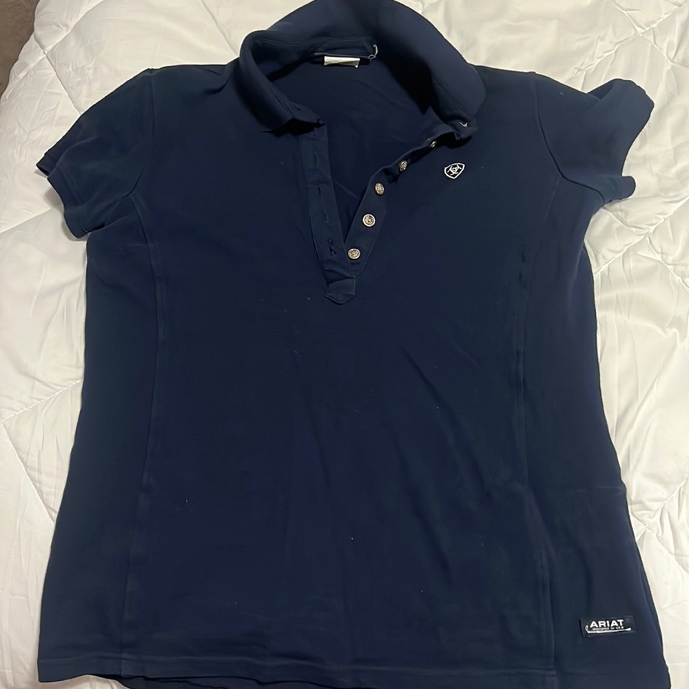 Arias blue polo size medium